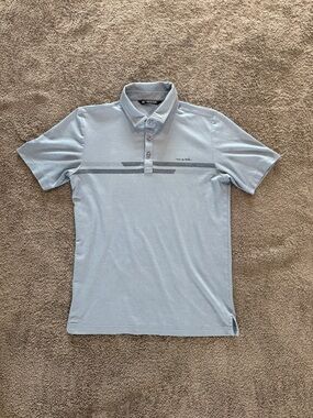 Travis Mathew Light Blue Polo with Gray Chest Stripe
